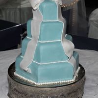 Tiffany Blue Wedding Cake This is the cake I made for my own wedding! Okay, so it's a dummy cake (I'm not completely crazy!), hexagon shape, covered in...