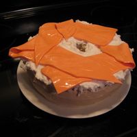 Bagel And Lox The bagel and cream cheese are buttercream with some fondant lox.