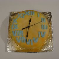 Clock Cake The hands on this clock actually move. You can tell time by this cake.