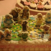 Candy Land The gameboard is an edible image, the cards and characters are edible image fondant plaques.