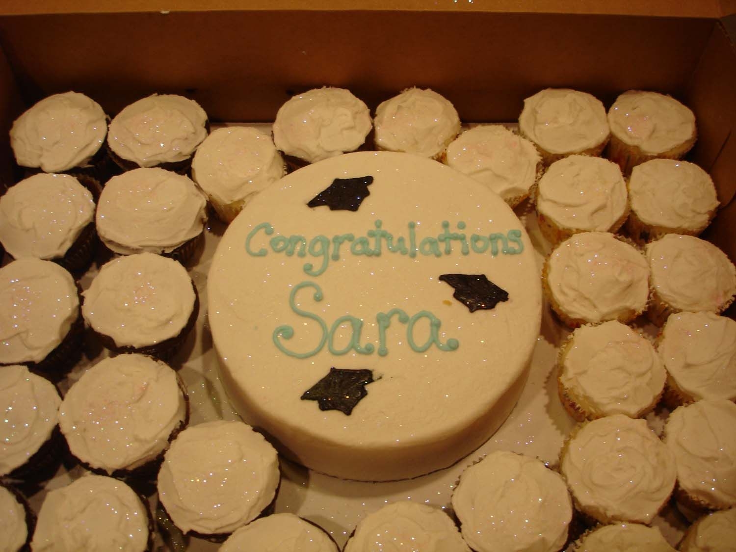 College Graduation Fondant graduation hats, bc icing and edible pixie dust.