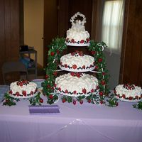 Wedding Berries Are Ringing This is the full set up. This cake was quite an adventure! The bottom cake is strawberry pound, middle tier is blueberry pound and the top...