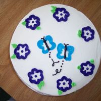 Fly Away!! This is a cake I made for a cake auction at my church. It was a fundraiser for our Mission Trip. The purple flowers trail along the side of...