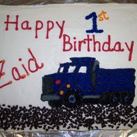 Grandpa's Dump Truck My dad works with the grandpa of this little boy. The grandpa actually came in to the bakery and ordered the cake for his grandson. Little...