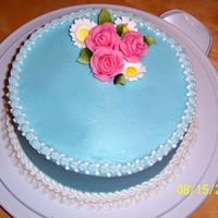 August Birthday For coworker's birthday. Scratch chocolate cake with dark chocolate ganache filling. I did make the fondant roses but cheated &...