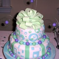 Shower This is the first time I've used fondant (Satin Ice) and I'm pretty happy with the way it turned out. The parents-to-be loved it...