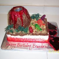Volcano The volcano was baked in an oven safe bowl then placed on top of layered 1/4 sheet cakes. The top was cut off of a soda can, it was...