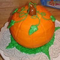 Pumpkin Cake #2 This is a collaborative effort between my husband and I. This was for a Halloween cake walk in 2007.