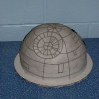 Death Star Cake This was a collaborative effort between my husband and I. Our kids wanted a Death Star for their birthday party and this was the result.