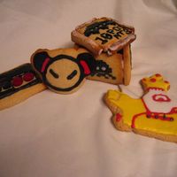 Birthday Cookies. I packed these cookies up with the Beatles birthday cake... Pucca, a controller, a Space Invaders box, and the yellow submarine.