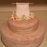 Graduation Cake With Diploma. This was before I finished the cake... I later painted the swirls black and wrote on the diploma, but I actually liked it more before!...