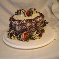 Strawberry Cake A strawberry cake I made recently... the order was for a flavor-oriented and not decoration-oriented cake, and I really went all out. It...