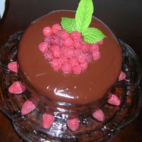Chocolate Raspberry Ganache Cheese Cake This is a 3 layer chocolate cake with a cheesecake middle layer filled and covered in chocolate raspberry ganache. It was delicious!...