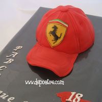 Ferrari Baseball Cap All of it is made out of fondant, and the logo was hand-painted.