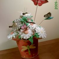 Dragonfly chocolate and vanilla cupcakes with strawberry filling, Dragonflies, butterflies and daisies are fondant,