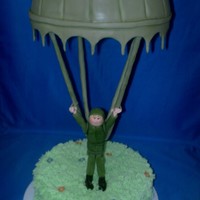 Parachute This cake was made for a exmilitar.lemon cake with pineapple filling.bottom cake with lemon buttercream grass and top cake with fondant