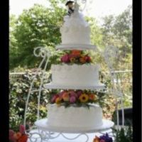 Wedding Cake Buttercreme with fondont rosettes.