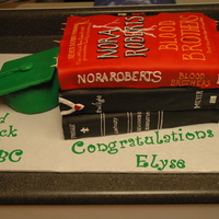 Books For Graduation Three books that the graduating girl really likes, Bible, Twilight and Nora Roberts. There are toothpicks under the top book to "hold&...