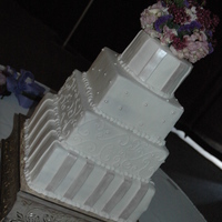 Wedding Cake - Buttercream With Fondant Accents All buttercream with fondant accents. Fresh flowers on top!