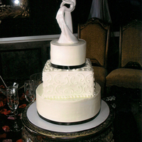 Nothing Like A Black & White All bc iced. The topper and cake was my gift the bride and groom. I love how simple and clean it looks.