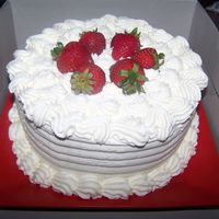 Strawberries And Cream Cake Vanilla cake with strawberry preserves and fresh strawberry filling. Covered with stabilized whipped cream frosting with fresh strawberry...