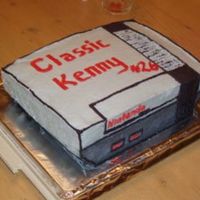 Video Game Cake This cake was carved from an 11x15 cake that was cut in half and stacked. It is iced with buttercream. I wish I could have had time to make...