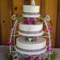 Wedding Cake With Silver This was a joint effort with a friend for my cousin's Wedding. His favorite color is silver.