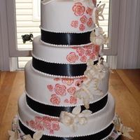 Fair Entry 2010 This was my entry for the fair. :) Dummies covered in fondant with fondant butterflies dusted in gold luster dust. Flowers on cake are hand...