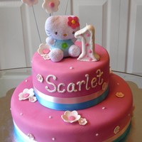 Hello Kitty 1St Birthday Hello Kitty 1st Birthday. Yellow cake with traditional buttercream, marshmallow fondant & gumpaste flowers.