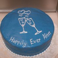 Toasting Glasses I made this cake for my soon to be sister-in-law's Bachelorette Party. I was really upset because the top layer cracked.. you can tell...