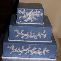 Winter Themed Wedding Cake I am doing up dummy cakes to have on hand. This is an idea I came up for a winter themed cake. all fondant with details in royal icing.