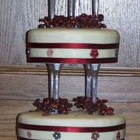Round Wedding Cake Four Tiered This is a cake I did a couple of weekends ago. Top three layers are rice krispie cake and the bottom is marble cake with buttercream...