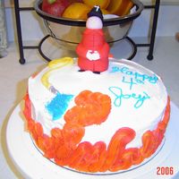 Joey's 4Th Birthday Cake This is a white cake with chocolate sprinkles to resemble a dalmation. The fireman and hose are all made of fonadant, the nozzle is fondant...