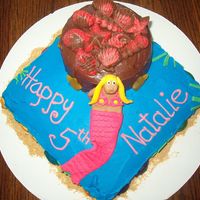 Under The Sea With A Mermaid Made this cake for a friend's 5th birthday. Everything is edible; the seasheels on top are chocolate, the mermaid is fondant, the fish...