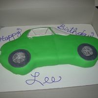 Car (Camaro) I made this for my friend's birthday, she loves 1st generation camaros. This was my first attempt at a car and fondant, I have room...