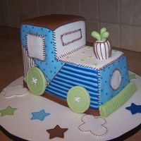 Toy Train Baby Shower Cake This cake was designed to match the baby shower invitation and party room decor.