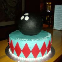 Bowling Party The cake and the ball was covered in buttercream, the red diamond shapes were cut from fondant.