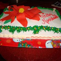 Poinsettia Cake FONDANT POINSETTIA , FRENCH VAINILLA CAKE WITH BUTTERCREAM GARLAND.