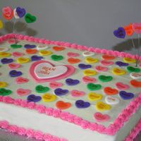 Conversation Heart Cake Cherry Chip sheet cake with buttercream frosting and fondant conversation hearts.