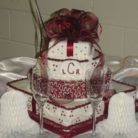 Wedding Cake This cake was inspired by a pic that I found here on CC. Of course it's not as good but the bride was pleased. This was my first time...