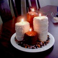 Burning Candles These are some candles I made for a candle party. I rolled the cake like a jelly roll, covered the cakes with chocolate candy melts. I used...