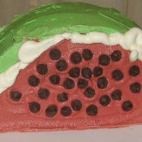 Watermelon Theme, flavor, and colors were picked by one of my children, they also frosted the cake with a little help from me.