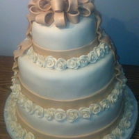 Anniversary Cake This is a cake done for 20th anniversary vow renewal. This was my first time making fondant roses. This cake is done with MMF, just...