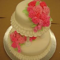 My First Wedding Cake This was the final project for Wilton level 3. There are 40 fondant roses in 3 different colours. I'm not a fan of the colour pink but...