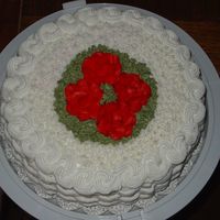 Birthday Cake For My Mom just a basketweave with some red roses and greenery - i had a nice flat/smooth top - but i messed up the words "happy birthday"...