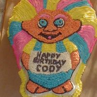 Troll Cake My husband actually done this cake with BC frosting, the recipie for a better scratch white cake, and a wilton troll pan.