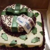 Christmas Present Here is a cake we did for a marketing firm who ordered several of these to give as gifts. That's why the writing on the tag doesn'...