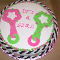Baby Shower 14" round all buttercream with what is suppose to be baby rattles. Hope that is what they look like!!