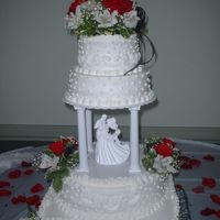 My 2Nd Wedding Cake This is all French Vanilla w/buttercream frosting. Fresh roses, peurevian lillies and baby's breath as decorations. Layers are 6&quot...