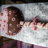 Rattle buttercream with fondant accents. handle is also cake.